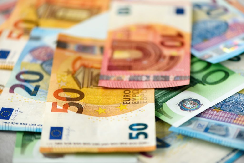 Euro currency money banknotes background. Payment and cash concept. Announced cancellation of five